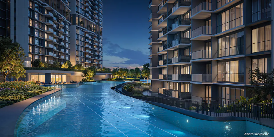 The waterscape running between the blocks after dark at Lentor Gardens Residences.